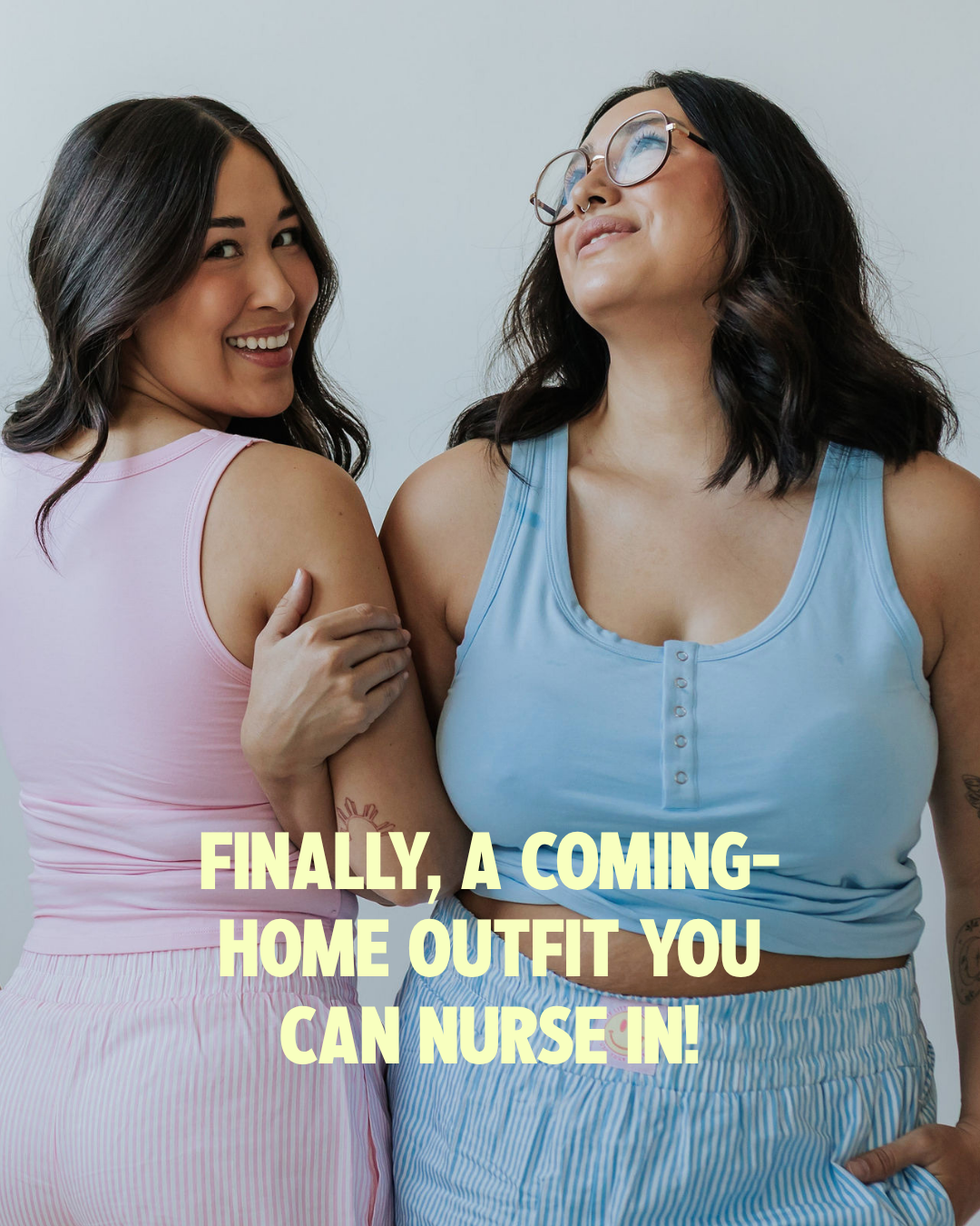 Two moms wearing the Postpartum Tank in pink and blue with matching pajama shorts, a cute coming-home-from-the-hospital outfit you can nurse in